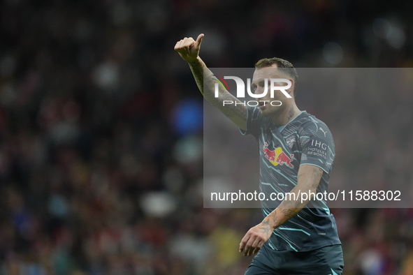 David Raum left-Back of RB Leipzig and Germany reacts during the UEFA Champions League 2024/25 League Phase MD1 match between Atletico de Ma...