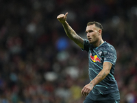 David Raum left-Back of RB Leipzig and Germany reacts during the UEFA Champions League 2024/25 League Phase MD1 match between Atletico de Ma...