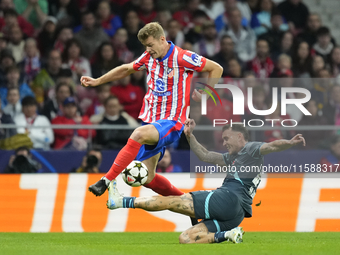 Alexander Sorloth centre-forward of Atletico de Madrid and Norway and David Raum left-Back of RB Leipzig and Germany compete for the ball du...