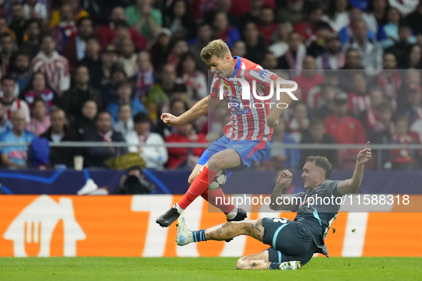 Alexander Sorloth centre-forward of Atletico de Madrid and Norway and David Raum left-Back of RB Leipzig and Germany compete for the ball du...