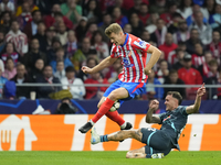 Alexander Sorloth centre-forward of Atletico de Madrid and Norway and David Raum left-Back of RB Leipzig and Germany compete for the ball du...