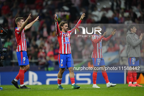 Atletico players celebrate victory after the UEFA Champions League 2024/25 League Phase MD1 match between Atletico de Madrid and RB Leipzig...