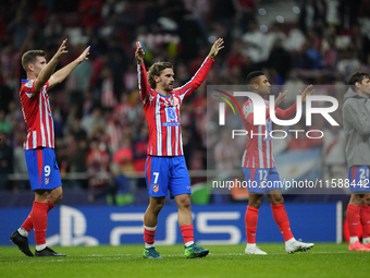 Atletico players celebrate victory after the UEFA Champions League 2024/25 League Phase MD1 match between Atletico de Madrid and RB Leipzig...