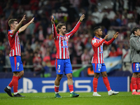 Atletico players celebrate victory after the UEFA Champions League 2024/25 League Phase MD1 match between Atletico de Madrid and RB Leipzig...