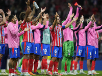 Atletico players celebrate victory after the UEFA Champions League 2024/25 League Phase MD1 match between Atletico de Madrid and RB Leipzig...