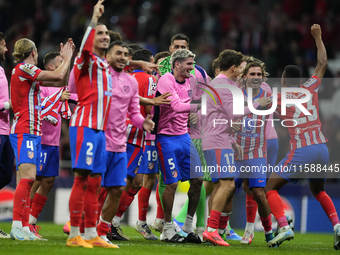 Atletico players celebrate victory after the UEFA Champions League 2024/25 League Phase MD1 match between Atletico de Madrid and RB Leipzig...