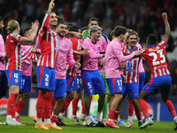 Atletico players celebrate victory after the UEFA Champions League 2024/25 League Phase MD1 match between Atletico de Madrid and RB Leipzig...