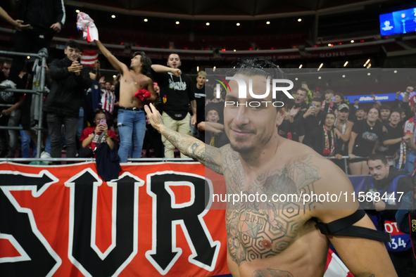 Jose Maria Gimenez centre-back of Atletico de Madrid and Uruguay celebrates victory with his supporters after winning the UEFA Champions Lea...