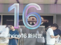 Customers experience an iPhone 16 at the Apple flagship store in Hangzhou, China, on September 20, 2024. (