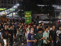 Protesters hold placards during the protest in Dhaka, Bangladesh, on September 19, 2024, against Bengali settler attacks on the Indigenous c...