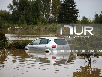 A car is seen in the water after Nysa Klodzka river flooded town of Lewin Brzeski in southwestern Poland, on September 19th, 2024. Storm Bor...