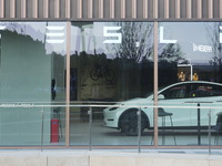 A new electric car is displayed at a new Tesla store in Shanghai, China, on August 9, 2024. (