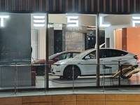 New electric cars are displayed at a new Tesla store in Shanghai, China, on August 9, 2024. (