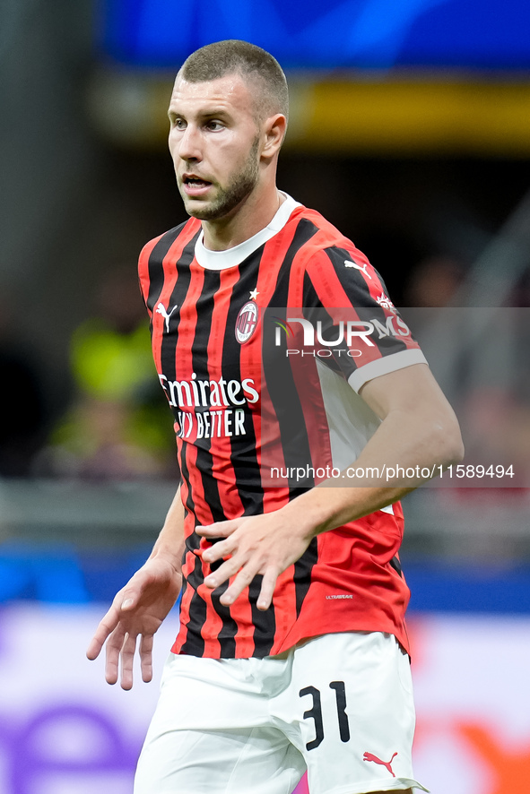 Strahinja Pavlovic of AC Milan looks on during the UEFA Champions League 2024/25 League Phase MD1 match between AC Milan and Liverpool FC at...