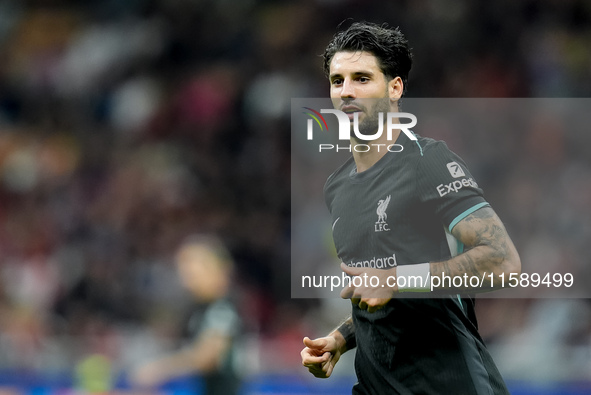 Dominik Szoboszlai of Liverpool FC looks on during the UEFA Champions League 2024/25 League Phase MD1 match between AC Milan and Liverpool F...