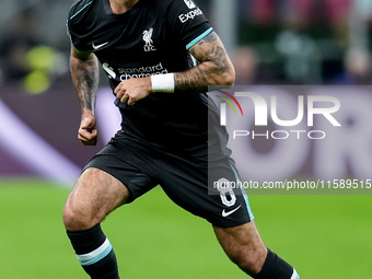 Dominik Szoboszlai of Liverpool FC during the UEFA Champions League 2024/25 League Phase MD1 match between AC Milan and Liverpool FC at Stad...