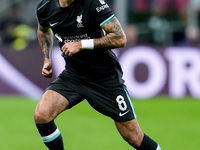 Dominik Szoboszlai of Liverpool FC during the UEFA Champions League 2024/25 League Phase MD1 match between AC Milan and Liverpool FC at Stad...