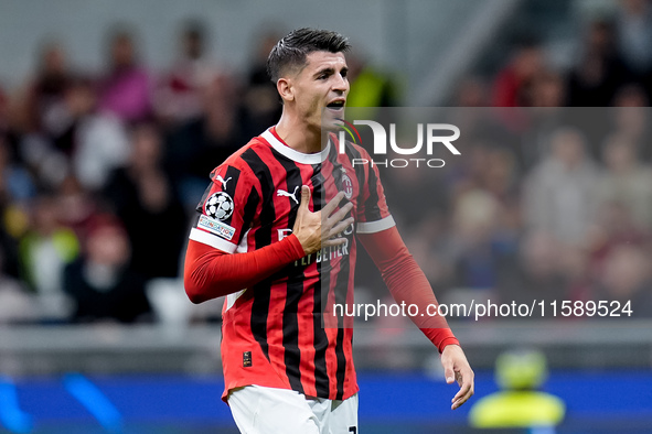 Alvaro Morata of AC Milan yells during the UEFA Champions League 2024/25 League Phase MD1 match between AC Milan and Liverpool FC at Stadio...