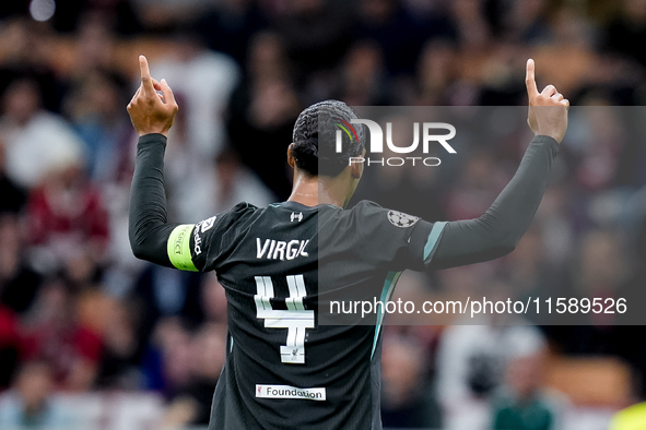 Virgil van Dijk of Liverpool FC celebrates during the UEFA Champions League 2024/25 League Phase MD1 match between AC Milan and Liverpool FC...