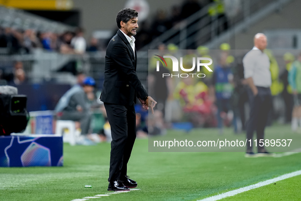 Paulo Fonseca head coach of AC Milan gestures during the UEFA Champions League 2024/25 League Phase MD1 match between AC Milan and Liverpool...