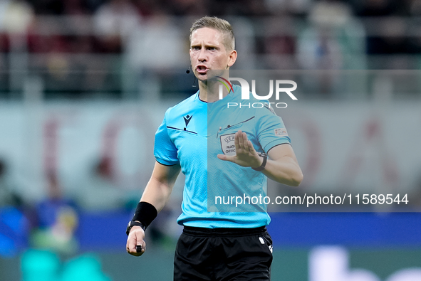 Referee Espen Eskas gestures during the UEFA Champions League 2024/25 League Phase MD1 match between AC Milan and Liverpool FC at Stadio San...