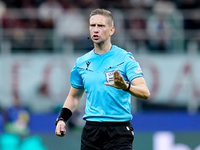 Referee Espen Eskas gestures during the UEFA Champions League 2024/25 League Phase MD1 match between AC Milan and Liverpool FC at Stadio San...