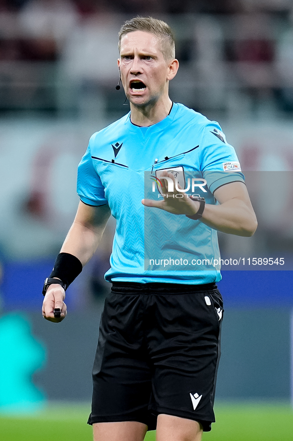 Referee Espen Eskas gestures during the UEFA Champions League 2024/25 League Phase MD1 match between AC Milan and Liverpool FC at Stadio San...