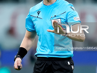 Referee Espen Eskas gestures during the UEFA Champions League 2024/25 League Phase MD1 match between AC Milan and Liverpool FC at Stadio San...