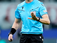 Referee Espen Eskas gestures during the UEFA Champions League 2024/25 League Phase MD1 match between AC Milan and Liverpool FC at Stadio San...