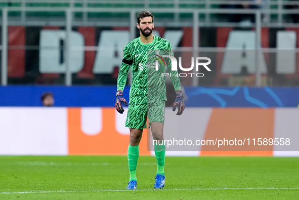 Alisson Becker of Liverpool FC looks on during the UEFA Champions League 2024/25 League Phase MD1 match between AC Milan and Liverpool FC at...