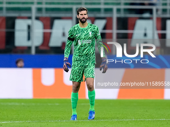 Alisson Becker of Liverpool FC looks on during the UEFA Champions League 2024/25 League Phase MD1 match between AC Milan and Liverpool FC at...