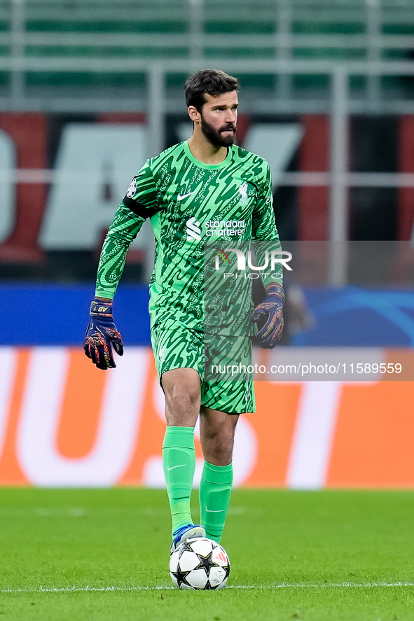 Alisson Becker of Liverpool FC in action during the UEFA Champions League 2024/25 League Phase MD1 match between AC Milan and Liverpool FC a...