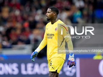 Mike Maignan of AC Milan looks on during the UEFA Champions League 2024/25 League Phase MD1 match between AC Milan and Liverpool FC at Stadi...