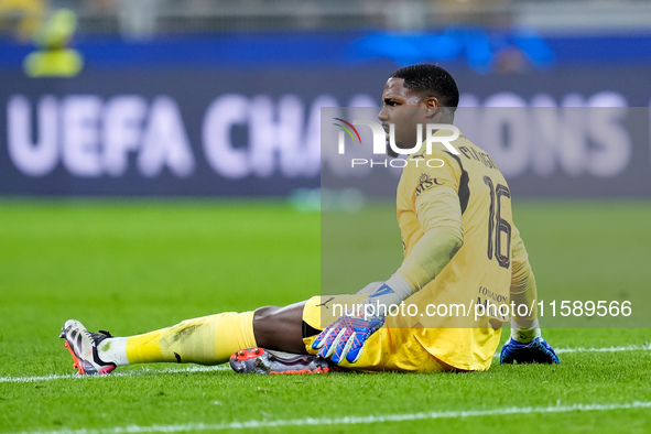 Mike Maignan of AC Milan lies down injured during the UEFA Champions League 2024/25 League Phase MD1 match between AC Milan and Liverpool FC...