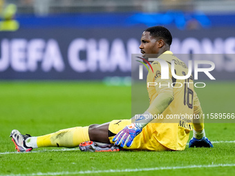 Mike Maignan of AC Milan lies down injured during the UEFA Champions League 2024/25 League Phase MD1 match between AC Milan and Liverpool FC...