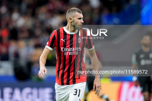 Strahinja Pavlovic of AC Milan during the UEFA Champions League 2024/25 League Phase MD1 match between AC Milan and Liverpool FC at Stadio S...