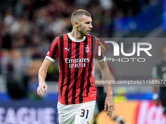 Strahinja Pavlovic of AC Milan during the UEFA Champions League 2024/25 League Phase MD1 match between AC Milan and Liverpool FC at Stadio S...