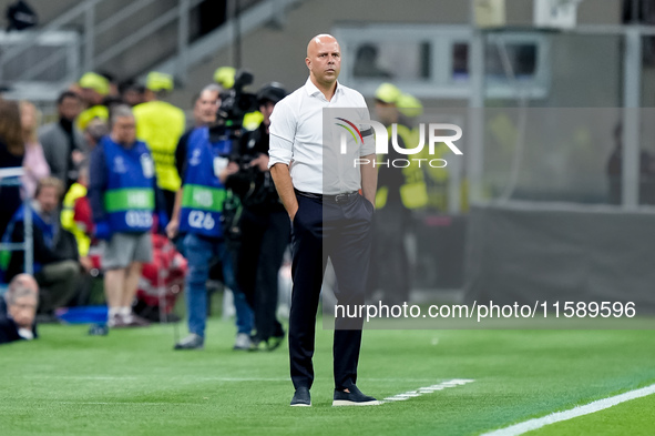 Arne Slot head coach of Liverpool FC looks on during the UEFA Champions League 2024/25 League Phase MD1 match between AC Milan and Liverpool...