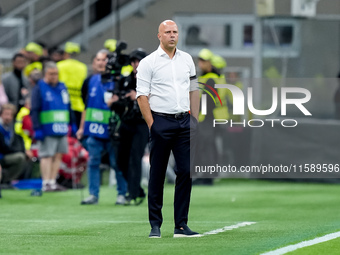 Arne Slot head coach of Liverpool FC looks on during the UEFA Champions League 2024/25 League Phase MD1 match between AC Milan and Liverpool...