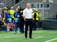 Arne Slot head coach of Liverpool FC looks on during the UEFA Champions League 2024/25 League Phase MD1 match between AC Milan and Liverpool...