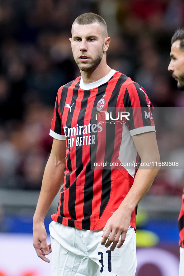 Strahinja Pavlovic of AC Milan looks on during the UEFA Champions League 2024/25 League Phase MD1 match between AC Milan and Liverpool FC at...