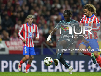 Amadou Haidara central midfield of RB Leipzig and Mali and Antoine Griezmann second striker of Atletico de Madrid and France compete for the...