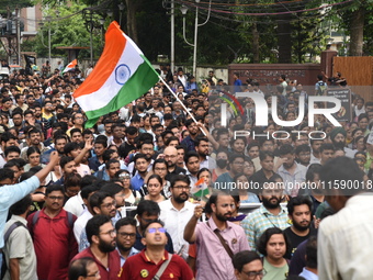 Doctors and citizens shout slogans and participate in a protest march to condemn the rape and murder of a doctor in Kolkata, India, on Septe...