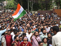 Doctors and citizens shout slogans and participate in a protest march to condemn the rape and murder of a doctor in Kolkata, India, on Septe...