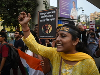 Doctors and citizens shout slogans and participate in a protest march to condemn the rape and murder of a doctor in Kolkata, India, on Septe...