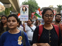 Doctors and citizens shout slogans and participate in a protest march to condemn the rape and murder of a doctor in Kolkata, India, on Septe...