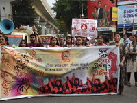 Doctors and citizens shout slogans and participate in a protest march to condemn the rape and murder of a doctor in Kolkata, India, on Septe...