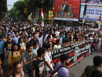 Doctors and citizens shout slogans and participate in a protest march to condemn the rape and murder of a doctor in Kolkata, India, on Septe...