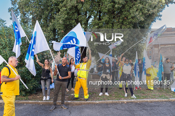 Railway workers protest against salary reductions and benefits cuts in Rome, Italy, on September 20, 2024. 