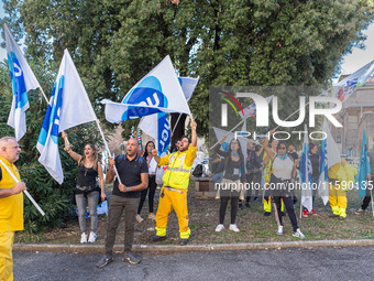 Railway workers protest against salary reductions and benefits cuts in Rome, Italy, on September 20, 2024. (